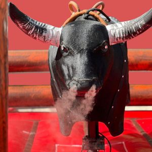 Mechananical bull with eyes light and smoking nose